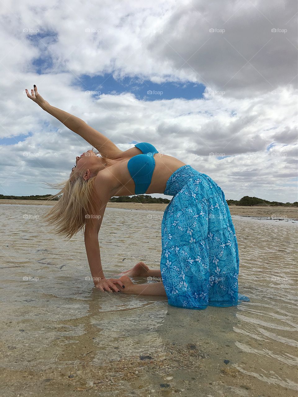 Woman posing at beach