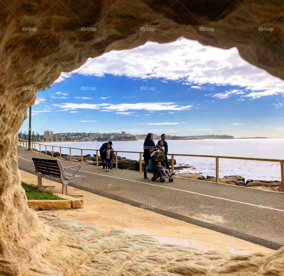 Looking through the cave to the beach walkway 
