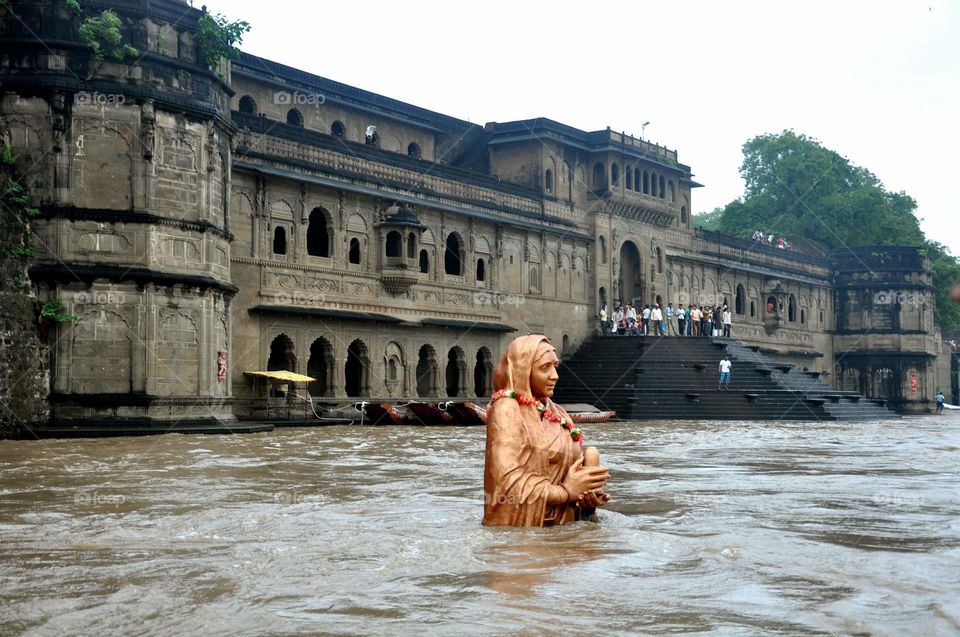 color statue in the flooded water