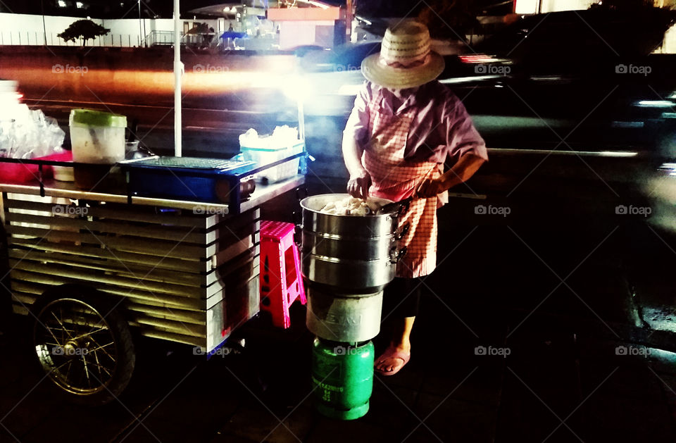 Old woman, night life and street food in Bangkok that people love it. If you want to try...come to Thailand.