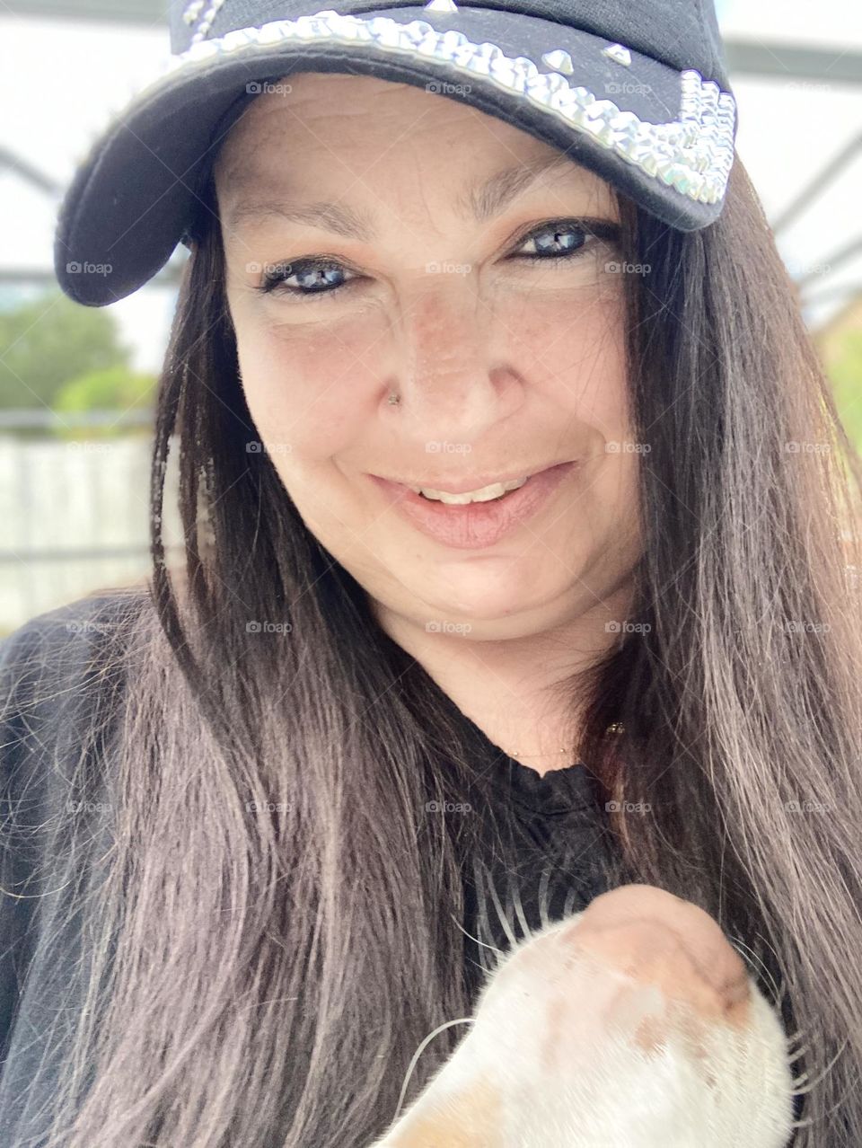 Looking at the phone selfie 