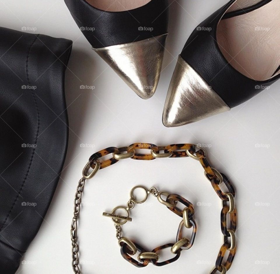 High angle view of shoe and barcelet