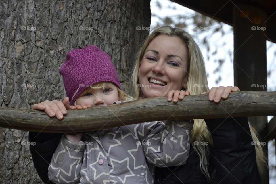 Mother with her little doughter at a playground in Malmö Sweden.