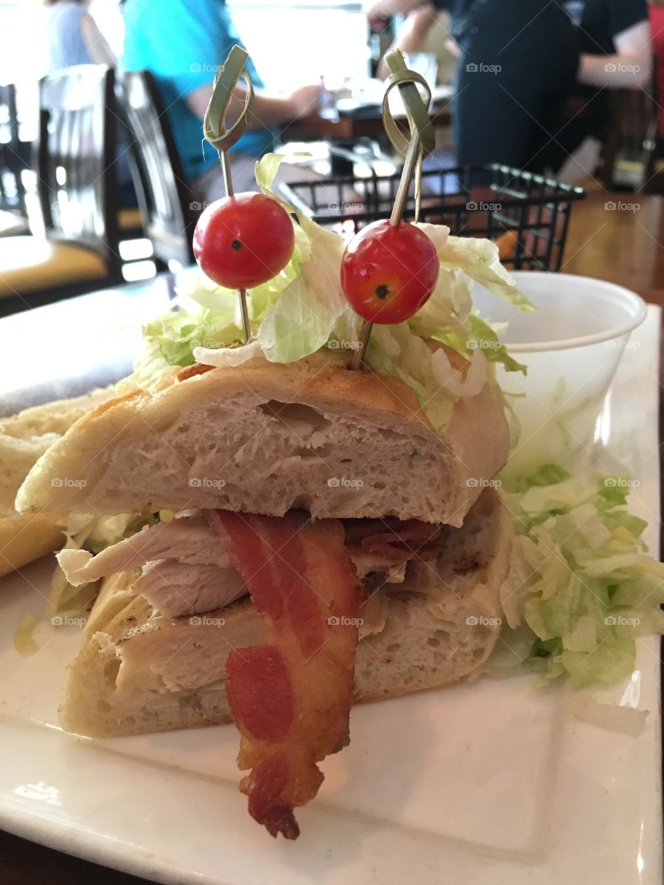 American turkey sub with a bacon tongue and tomato eyes