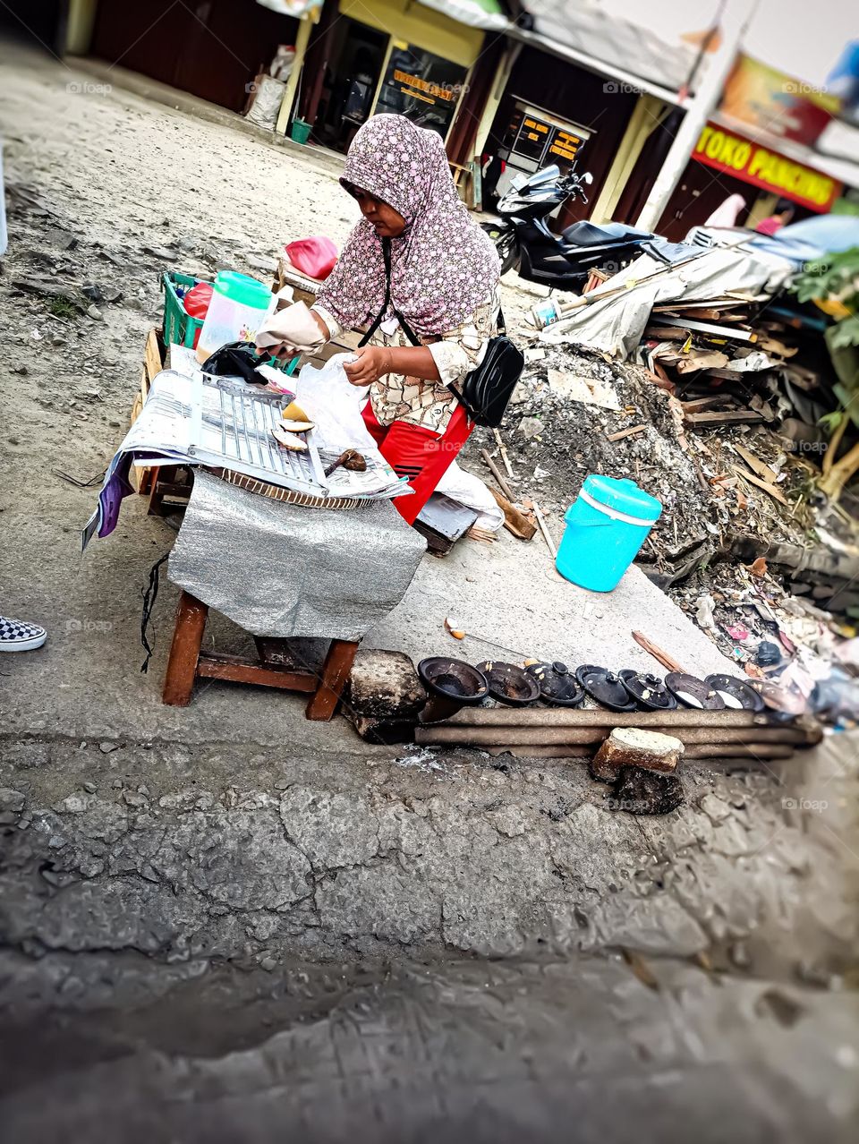 A Mother is Selling Traditional Meal, Near The Street