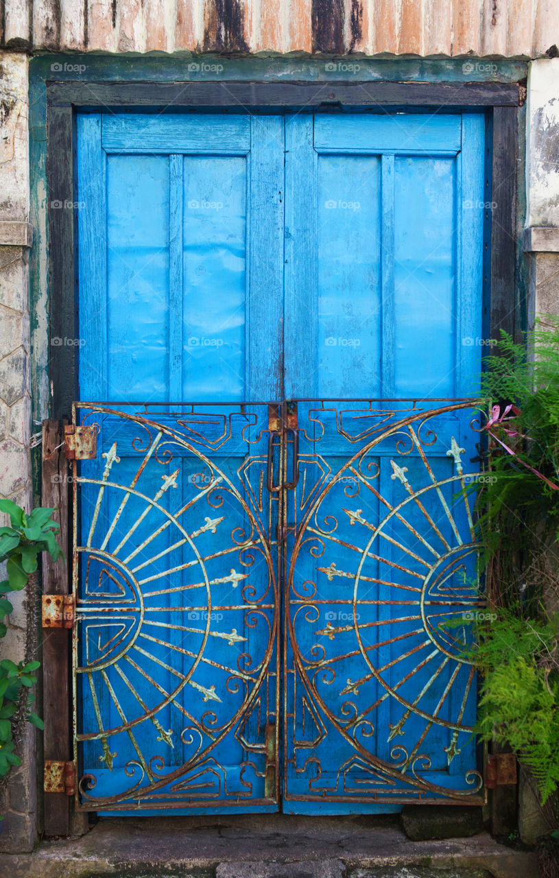 A blue door in Jogjakarta, Java, Indonesia 