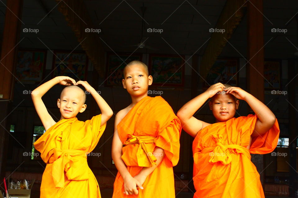 Thai boys studying the teaching of the Buddha during summer.