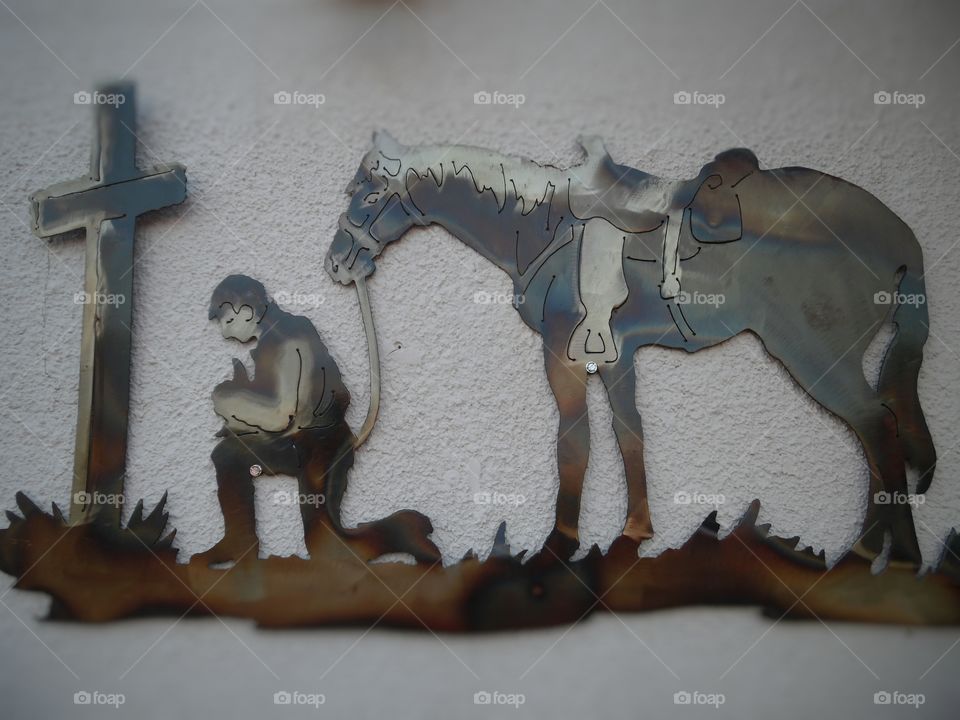 Cowboys. This is a picture of a Texas cowboy kneeling down in prayer. 👣 🚶 🏃 🔥 💨