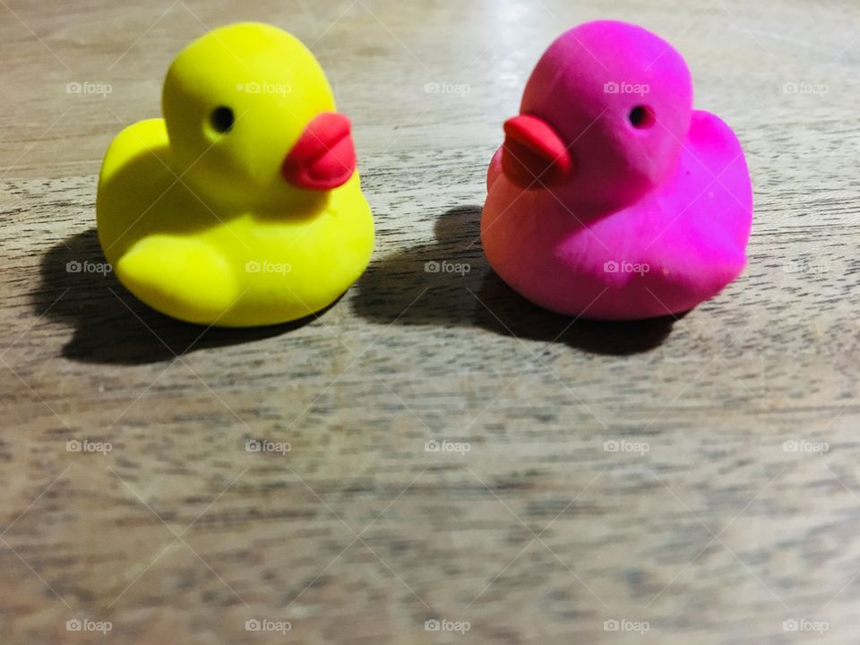Two Ducks-pink and yellow.