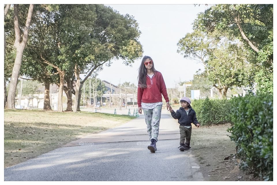 Family walk in park