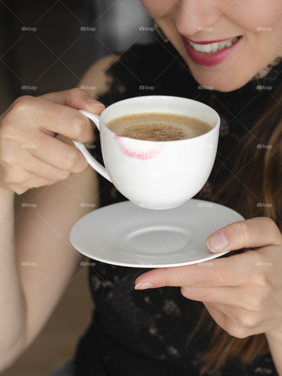 Lipstick on the white coffee cup