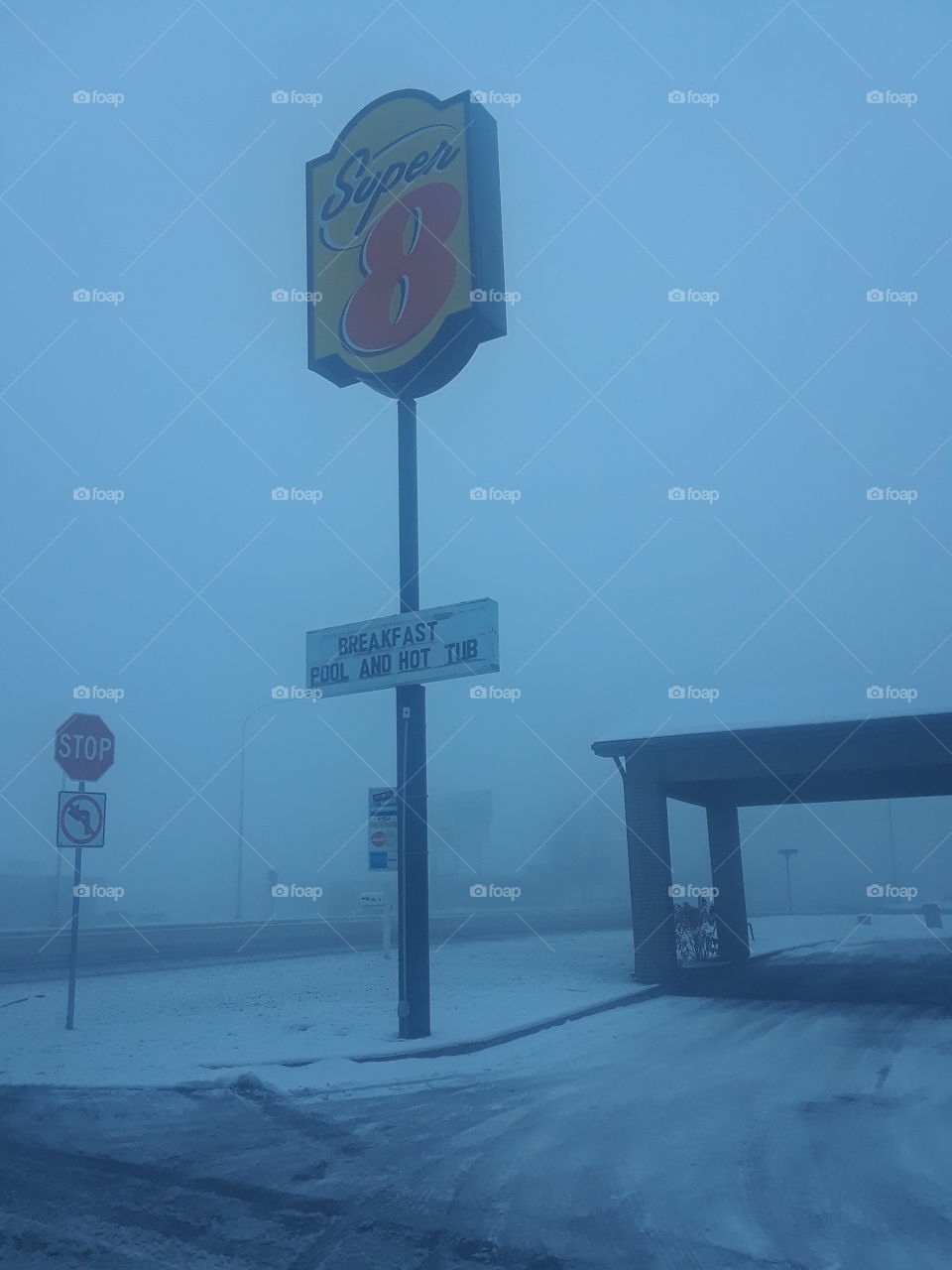 The Super 8 in Logan, UT surrounded by heavy fog