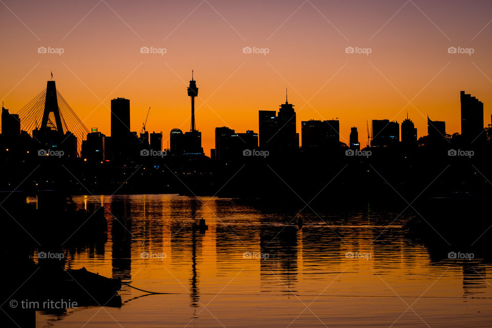 Sydney City silhouetted by dawn