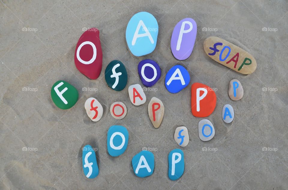 Foap with many colored stones on the sand