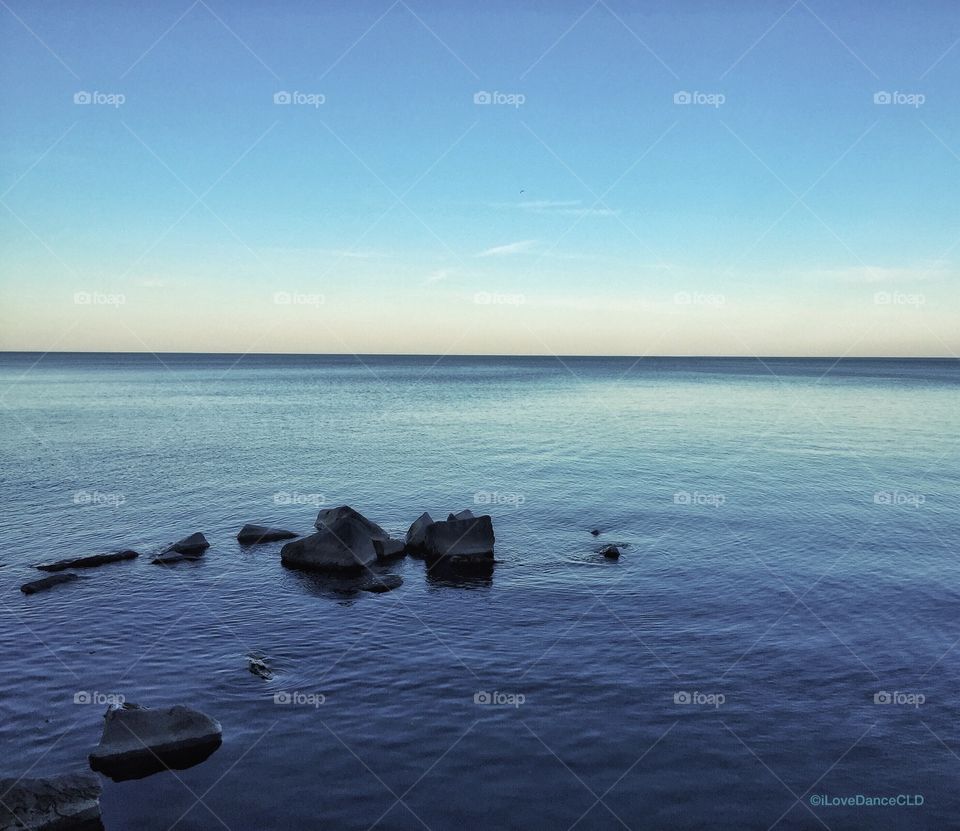 Calm lake michigan at twilight