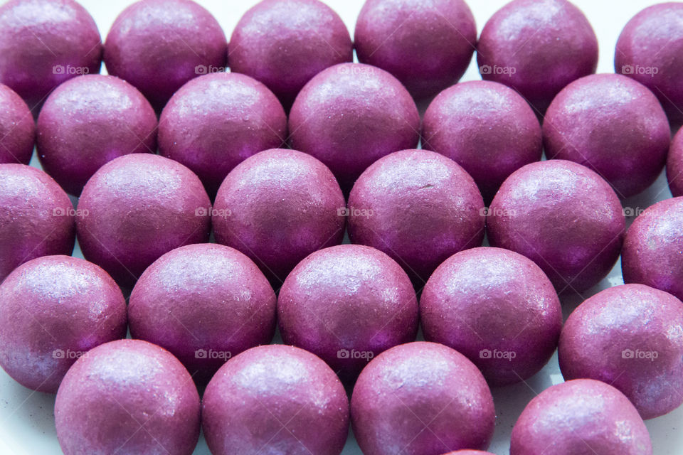 Close-up of purple round candy