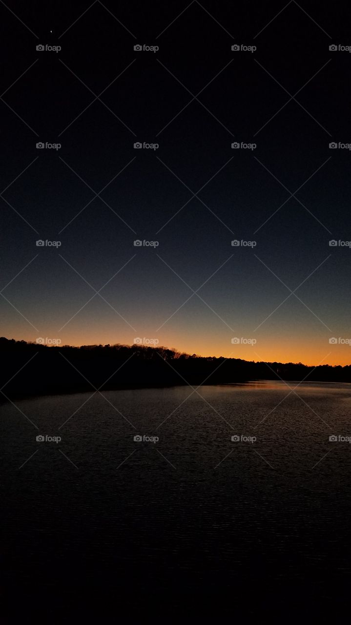 Dusk on the lake with star.