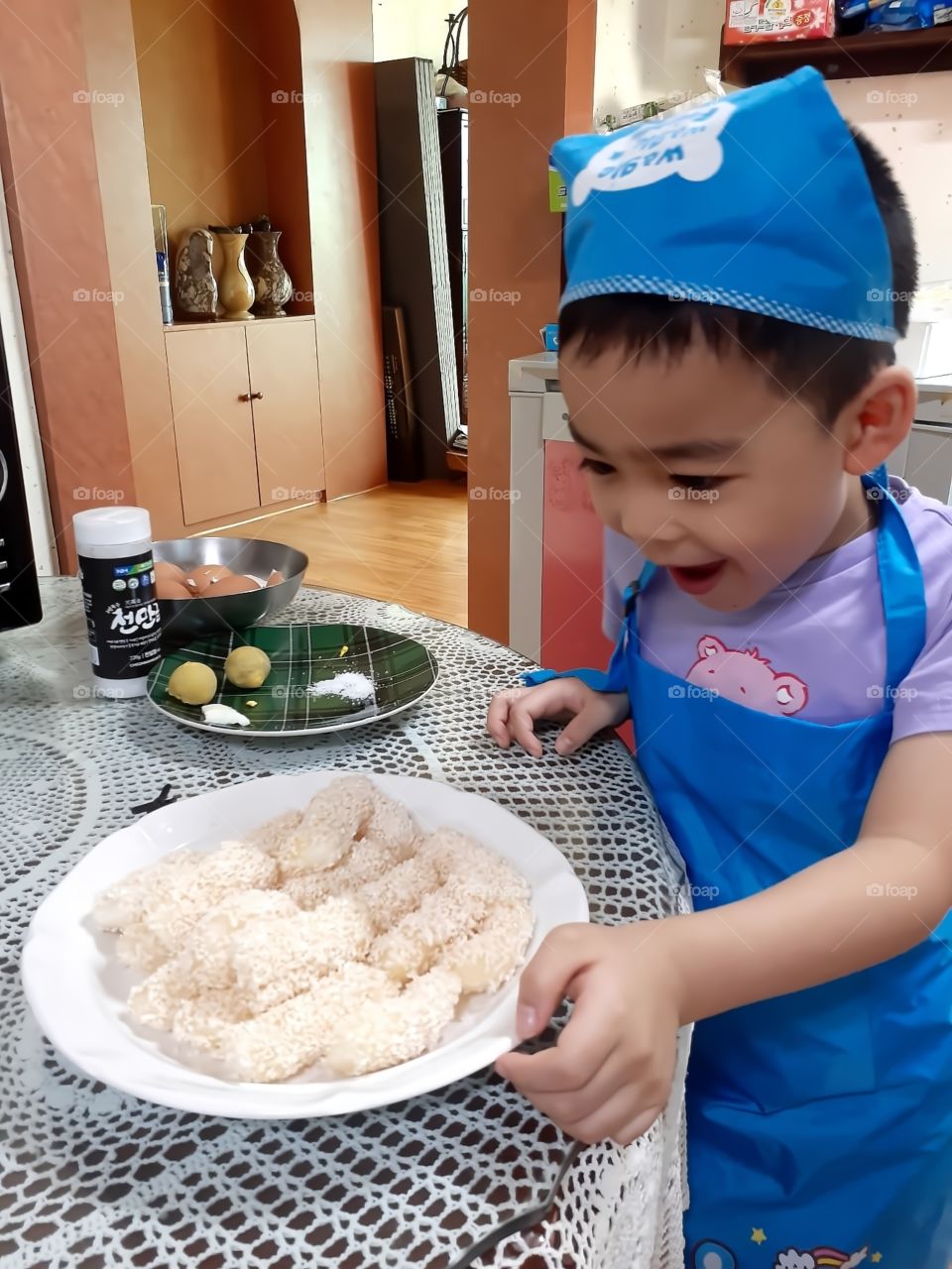 he loves sweet so, he is so happy he made a sweet snacks which is a korean tradition snacks on his own.