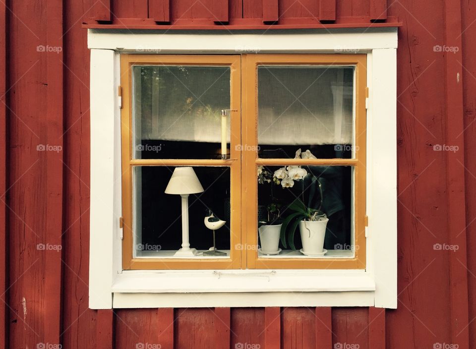 Swedish window. A shot of the window of the traditional Swedish wooden house