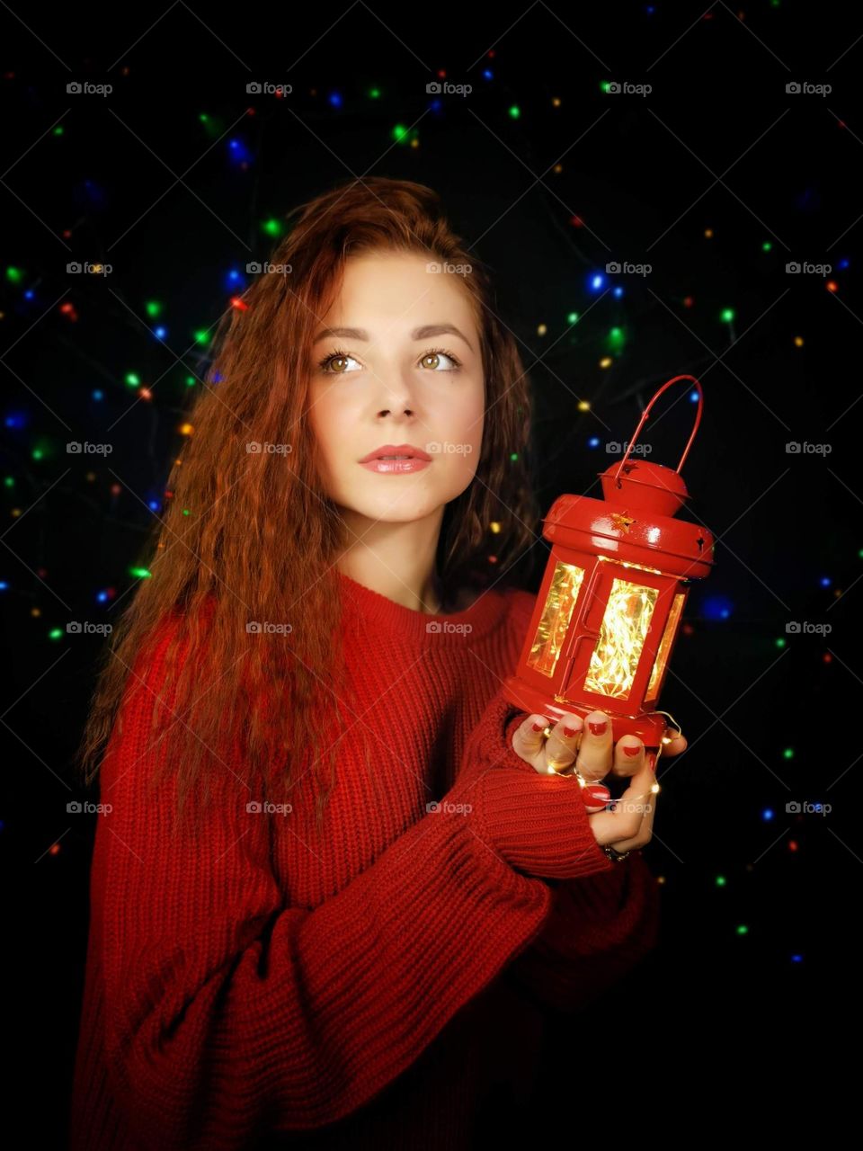 Young women portrait. Magic time. Lady in red. Red jumper. Red laterna. Natural beauty. Long hair. Beautiful eyes.