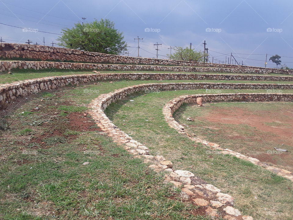 A theatre like circle in the park.