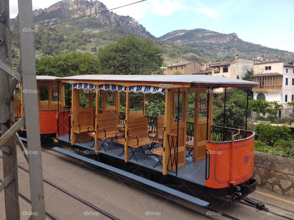 Public transport orange tram in menorca