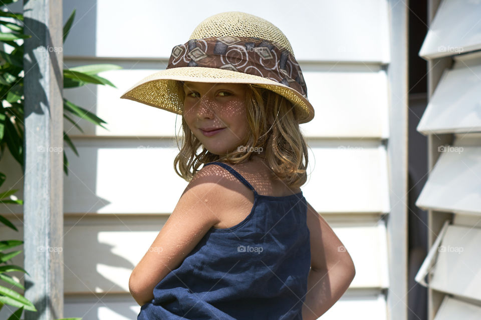 Light and Shadows through the straw hat