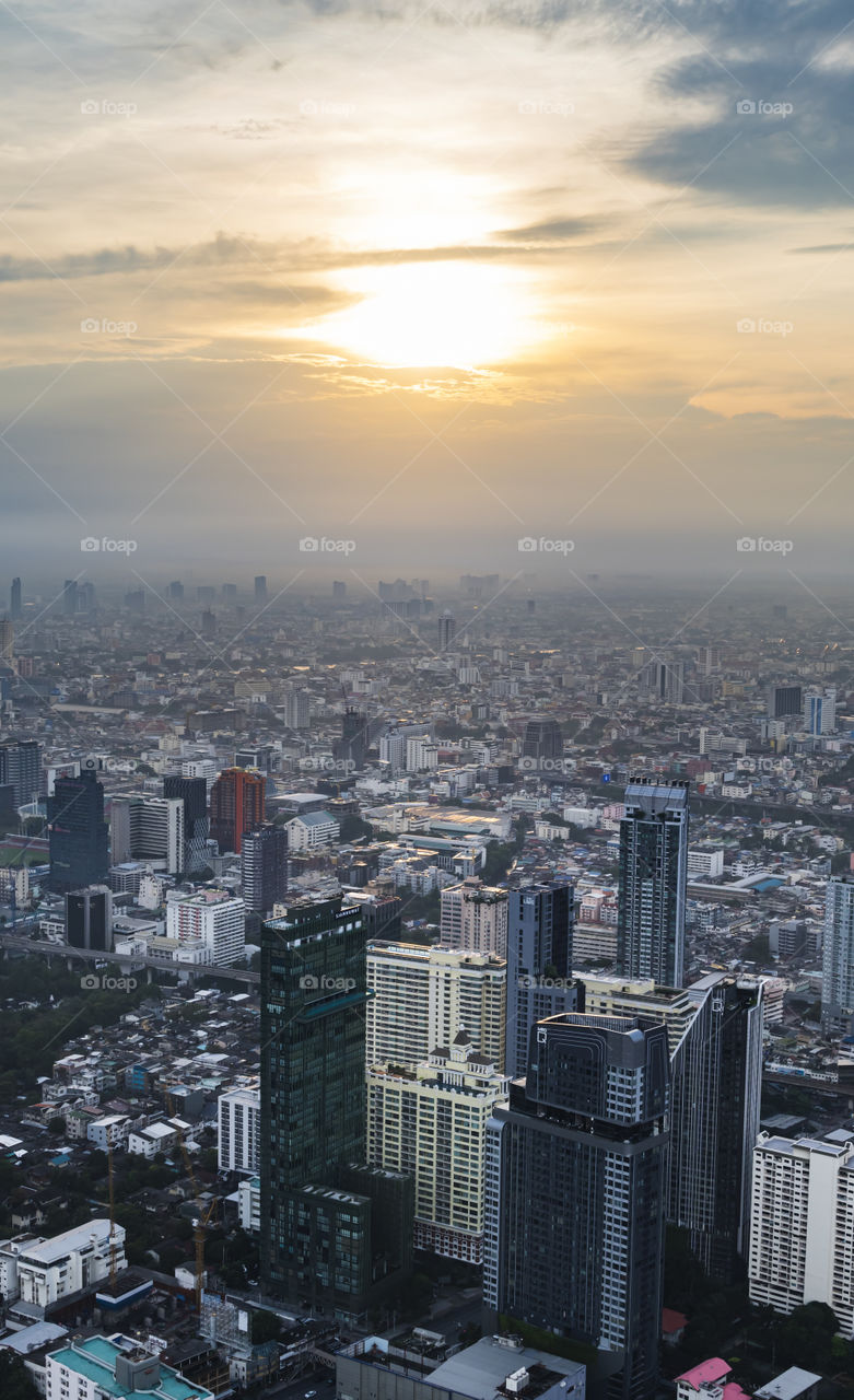 Thailand-November 21 2020:Misty conditions covered the skyscraper after heavy rain in Bangkok