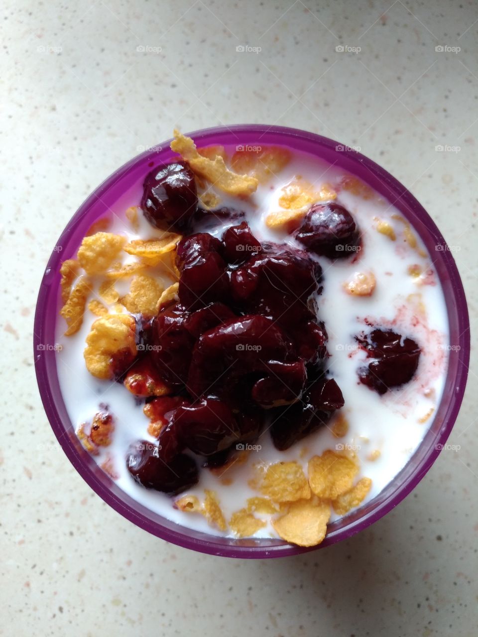cornflakes with milk and candied cherries
