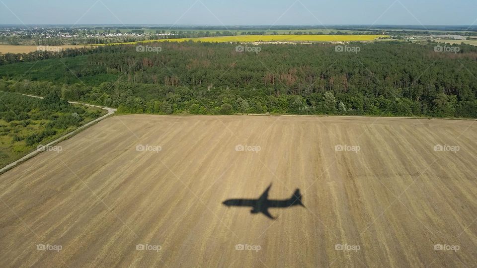 Landscape with shadow of airplane