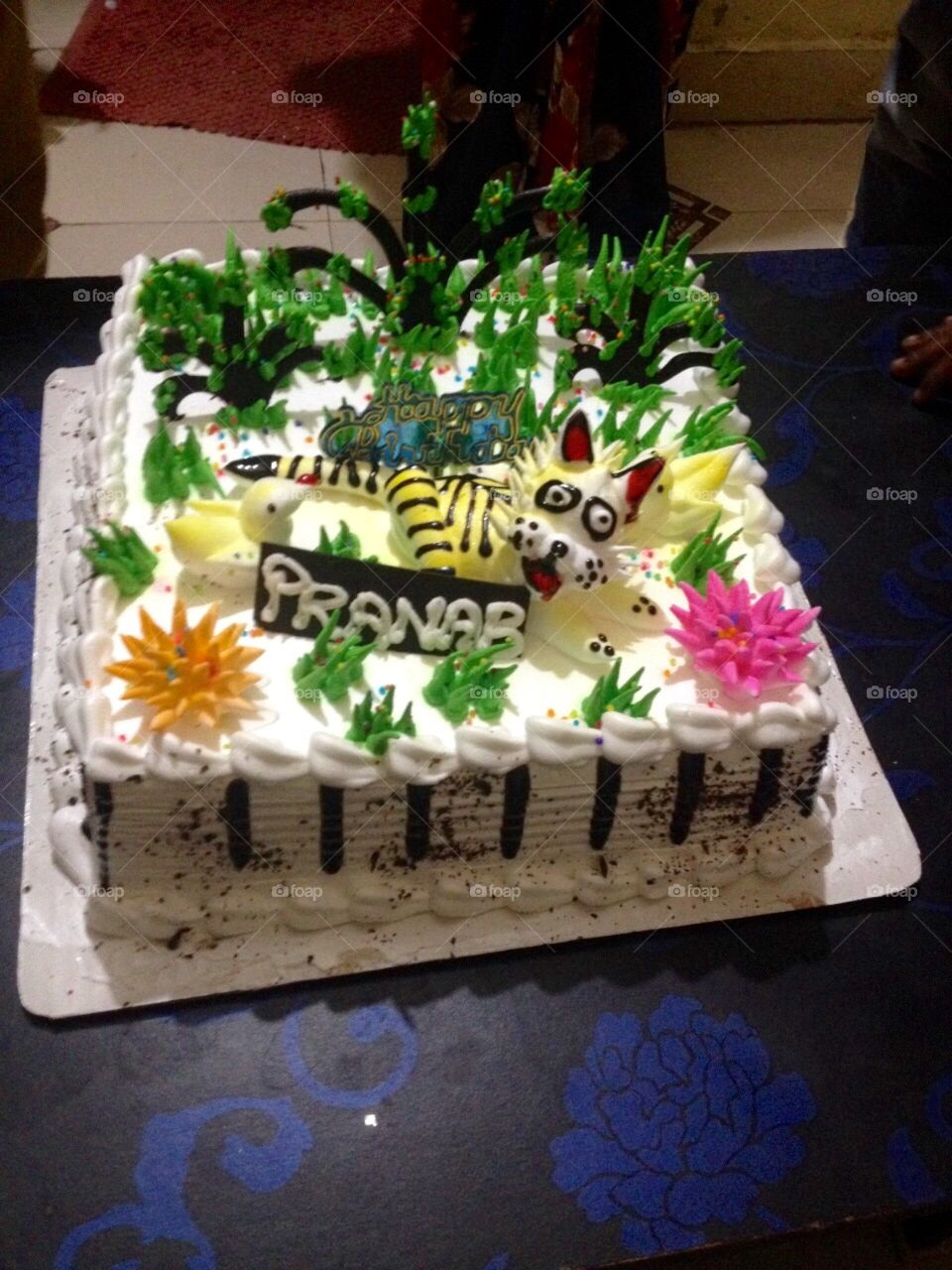 My birther's birthday cake its cake image is doremon . Doremon is the cartoon of pogo channel . This cake for each and every people will be given compliment . This cake is so testy which is made by special booking . This is egg cake .