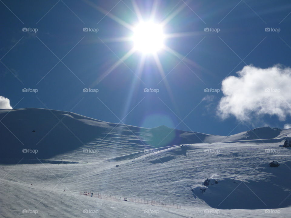 Sunlight on snowy land