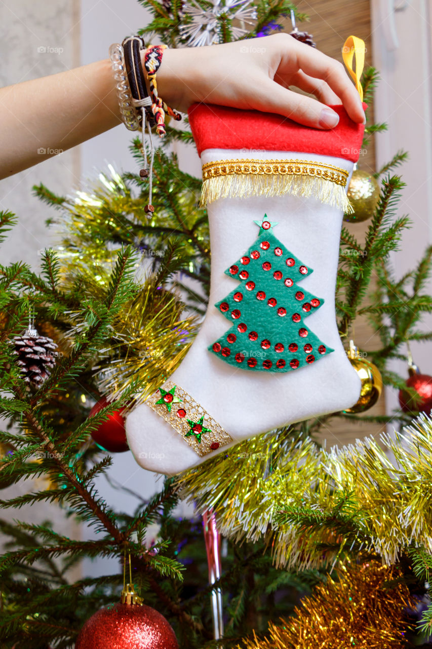 christmas handmade sock on the christmas tree