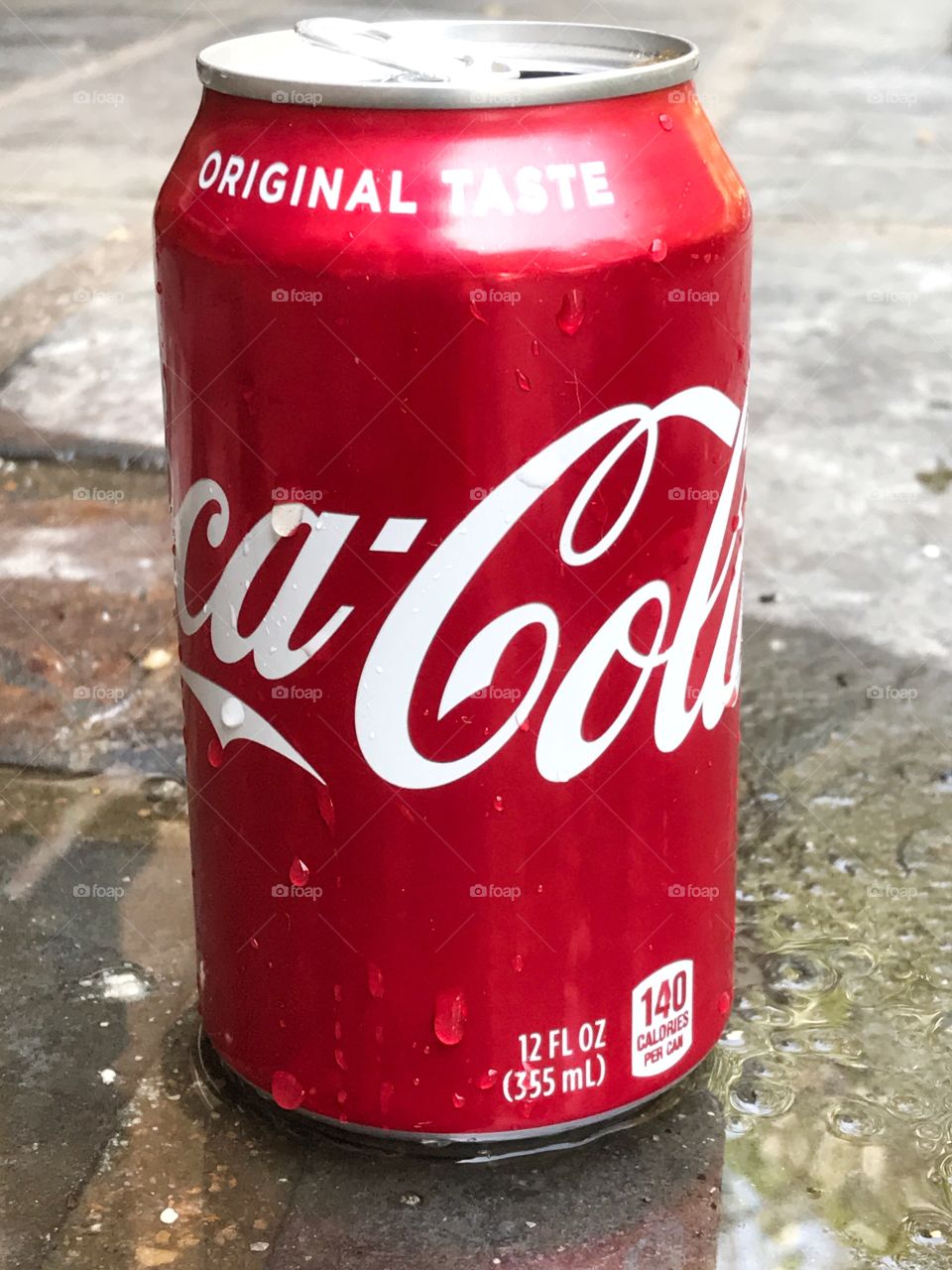 Coca Cola Left In The Rain