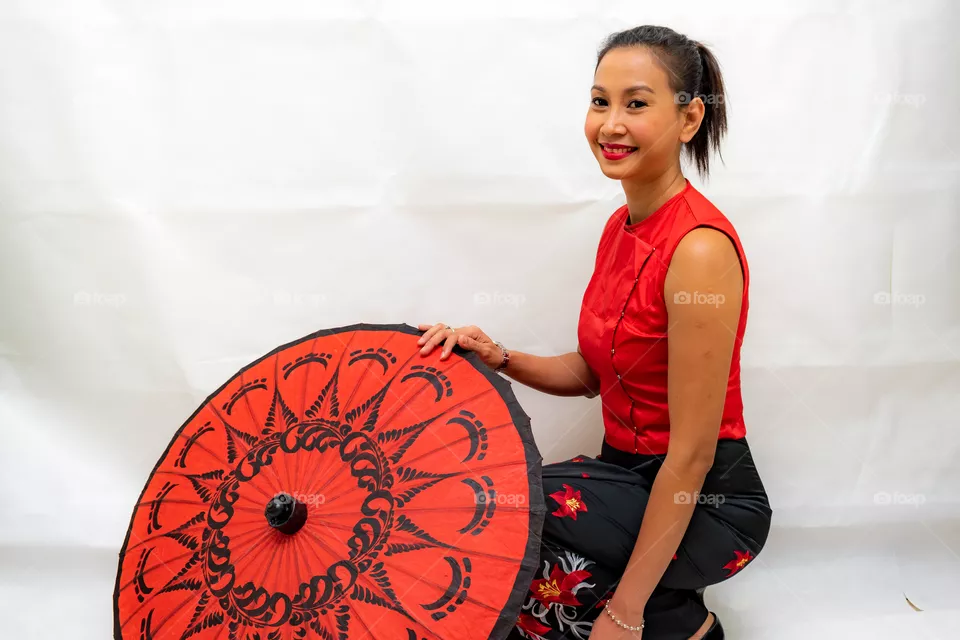 Beautiful lady with paper umbrella