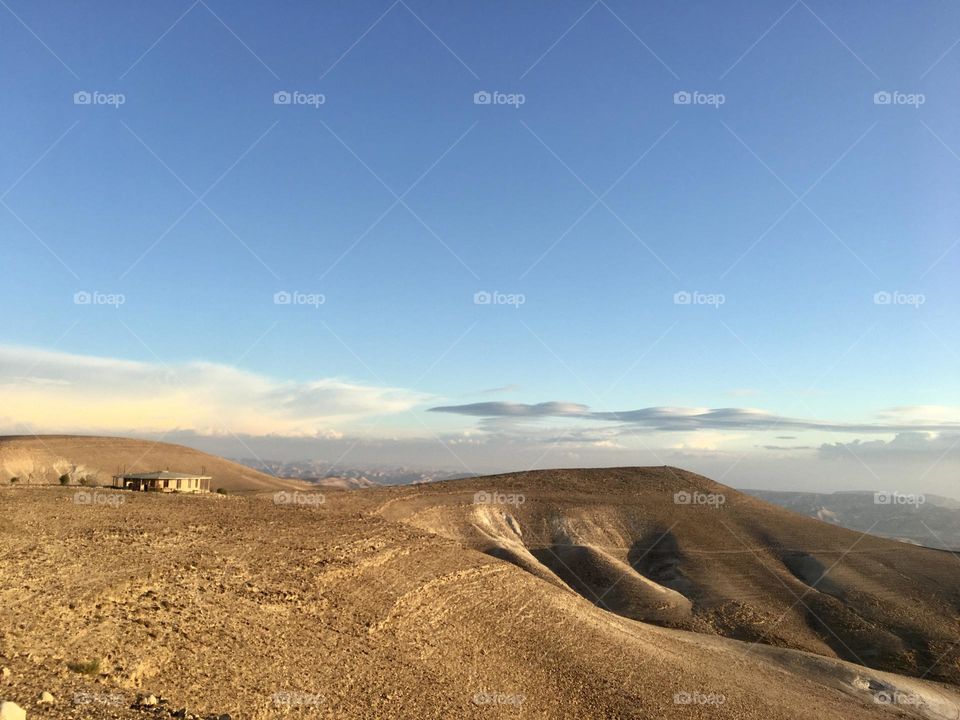 Desert mountains with blue sky and clouds