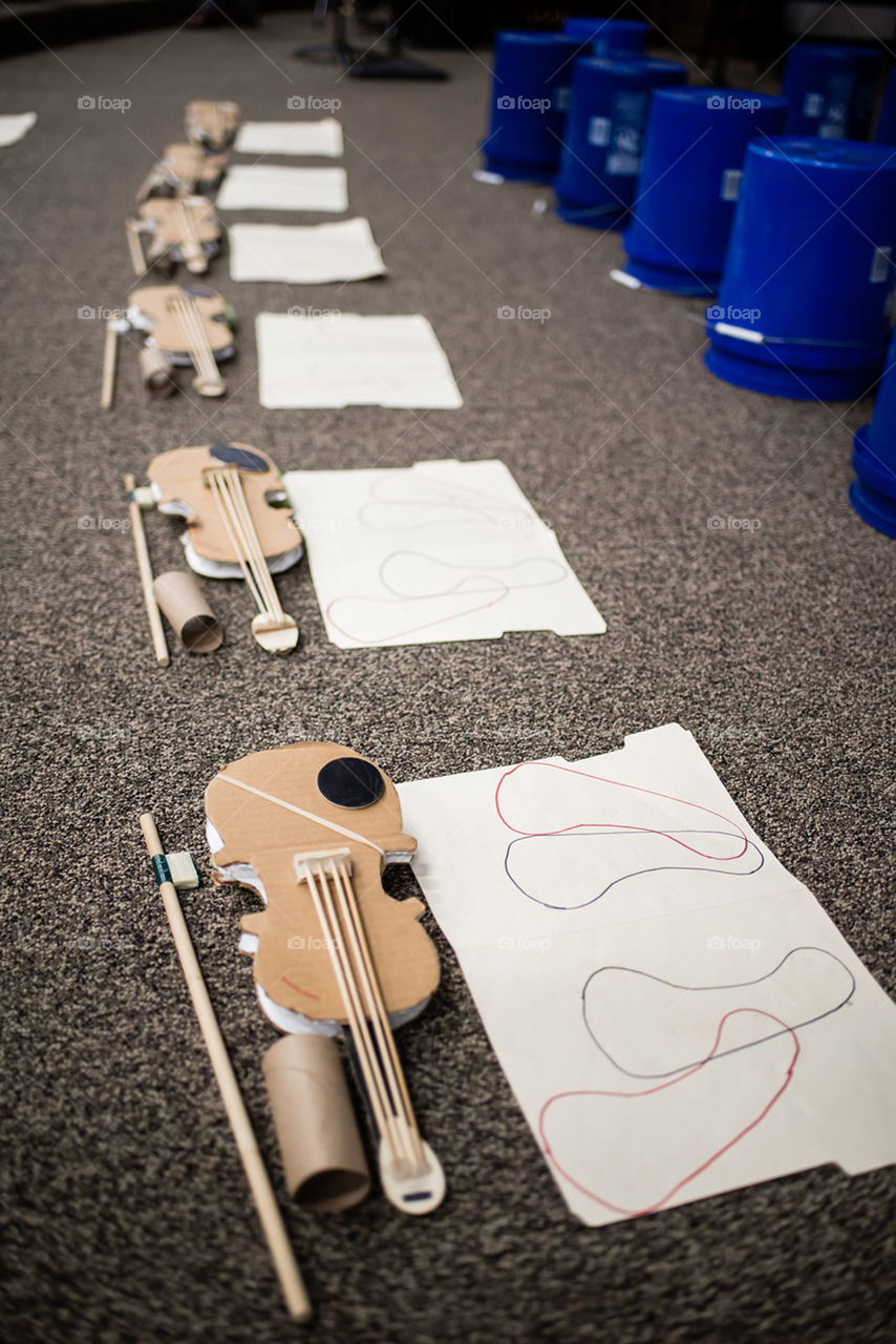 Practice paper violins at an elementary school 