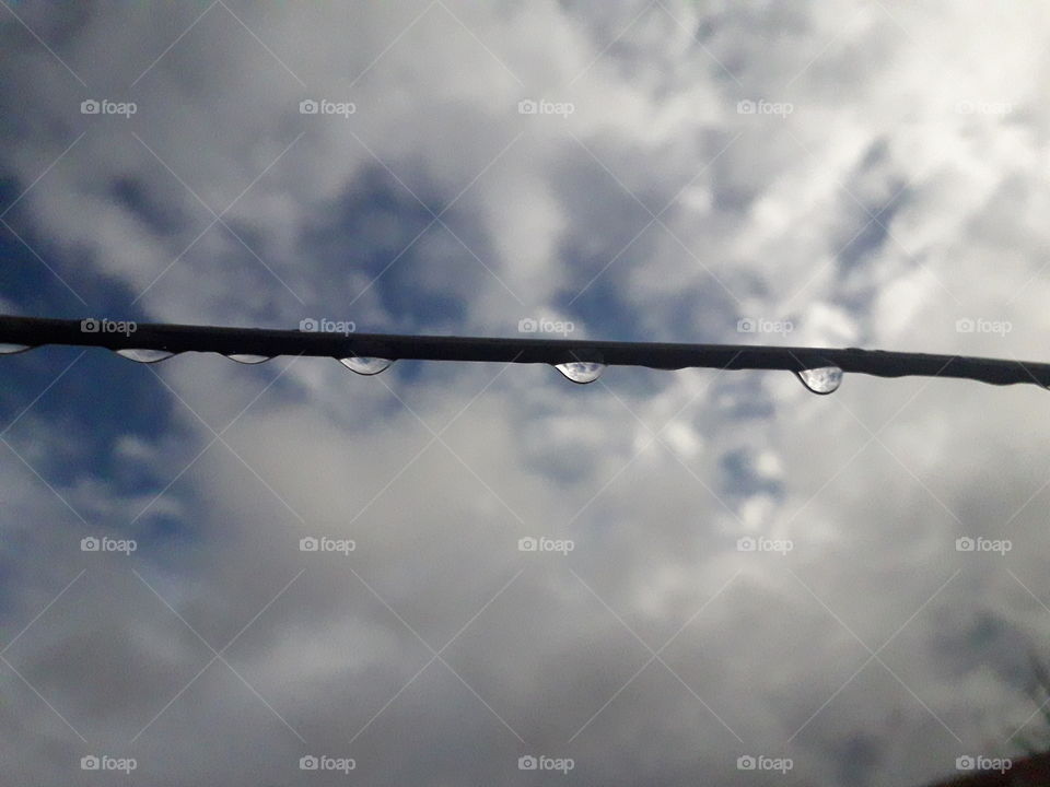 raindrops under blue sky