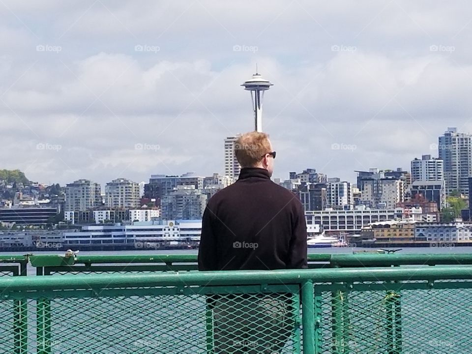 Person Staring at Seattle Skyline