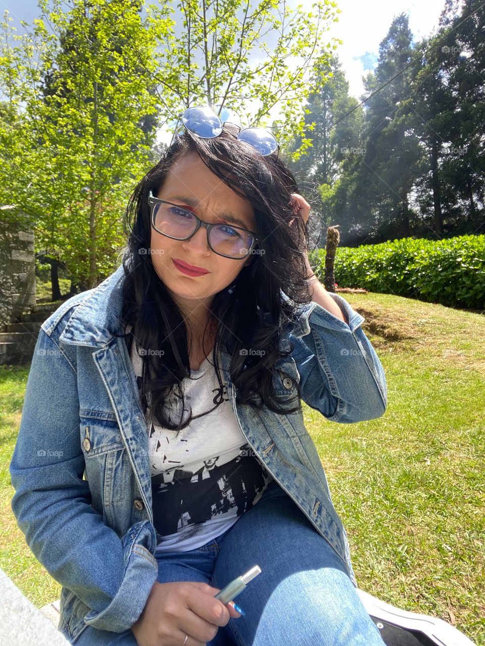 Confused and hungry girl in the park