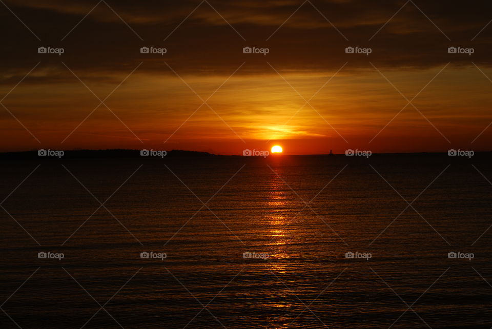 Dramatic over sea during sunset