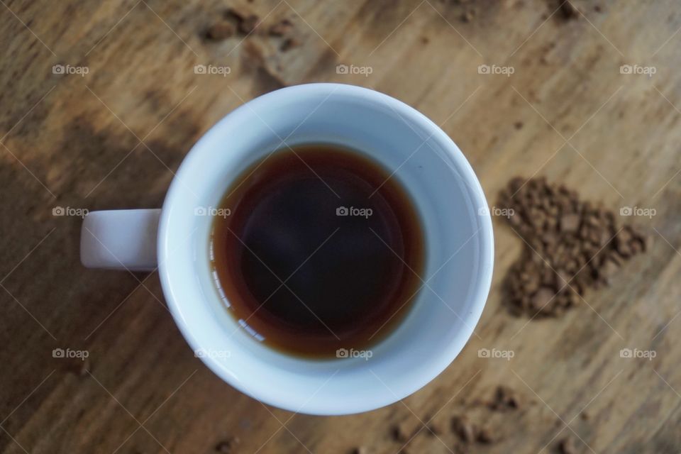 Elevated view of coffee on table