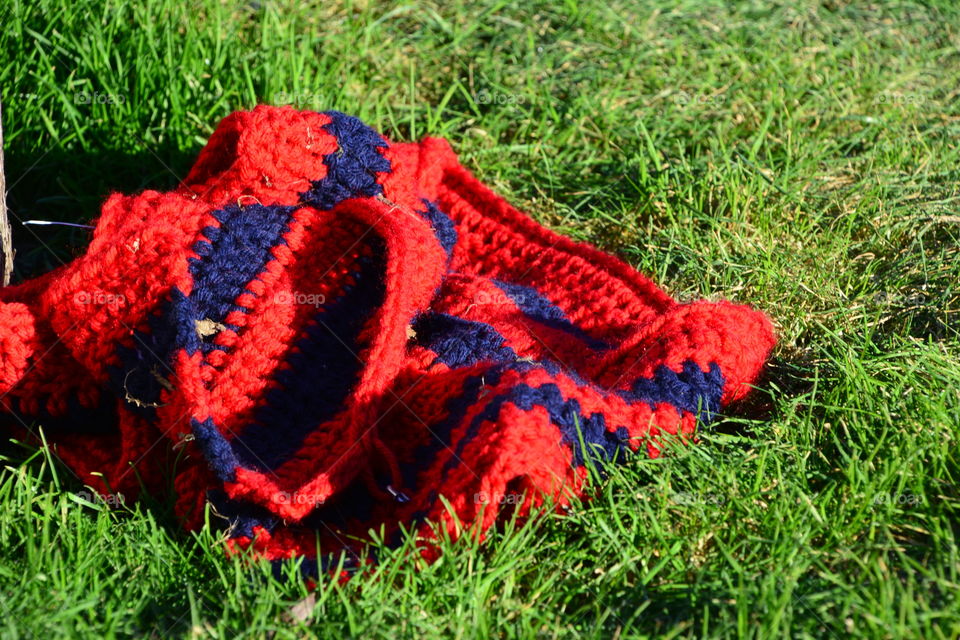 Wool scarf on grassy land