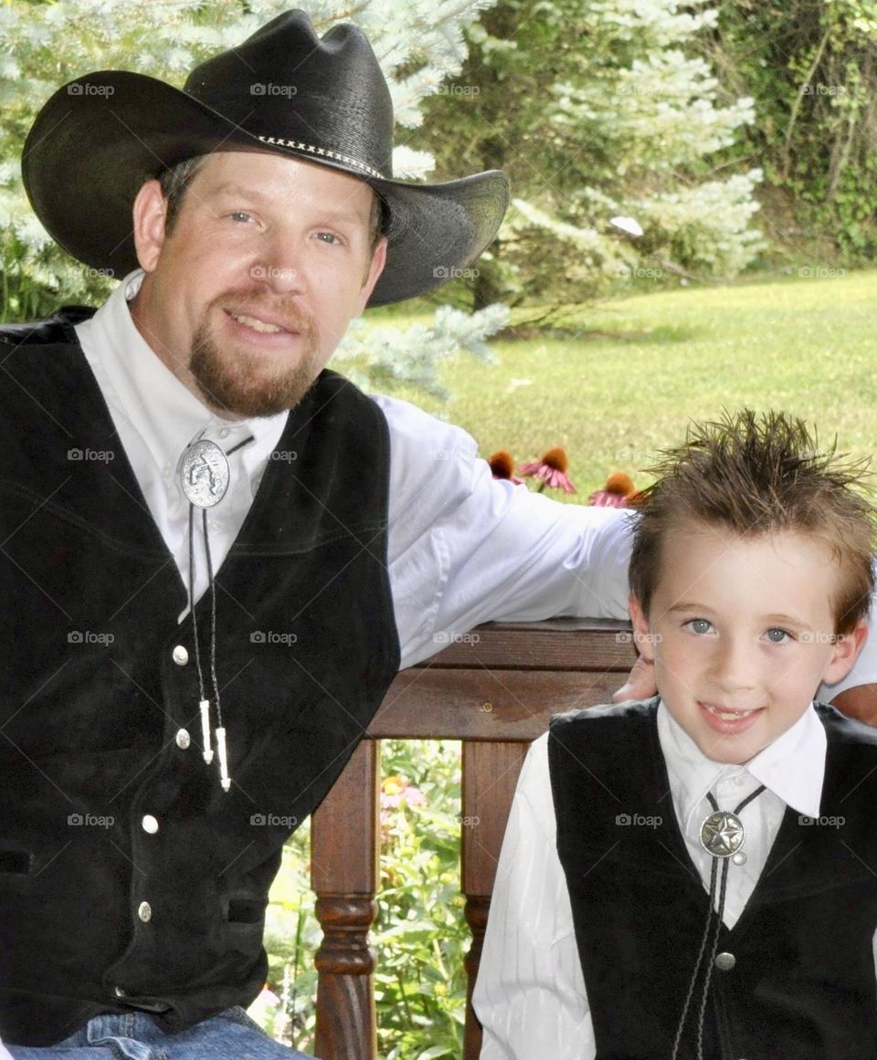 Man and young boy dressed alike