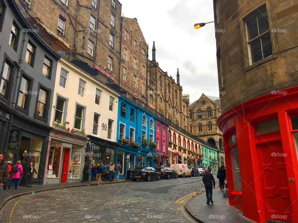 Winding, colorful street.  Grassmarket, Edinburgh, Scotland.