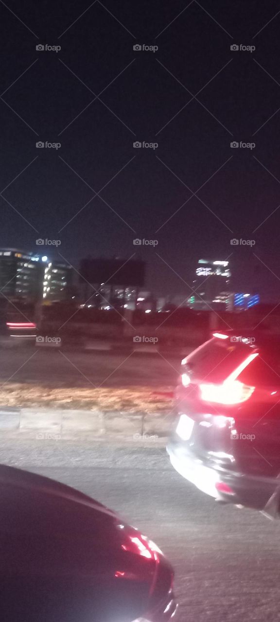 Twinkling windows , the beauty of evening light. Bask in the beauty of evening light with the view of light twinkling from these windows at night