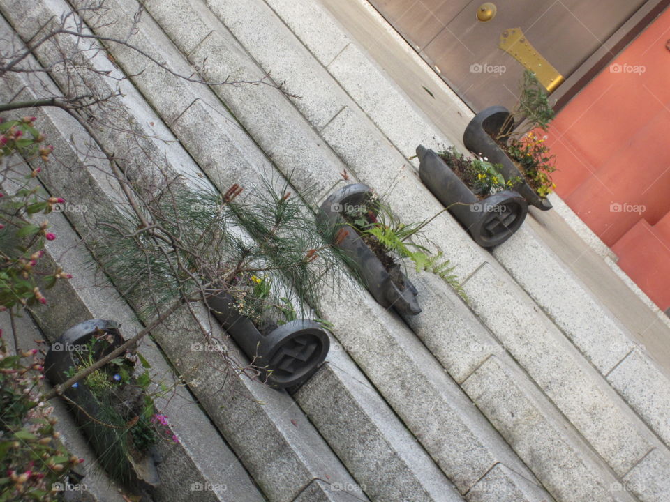 Stairs with Plants Arranged Diagonally.  Asakusa Kannon. Sensoji Buddhist Temple and Gardens. Tokyo, Japan.