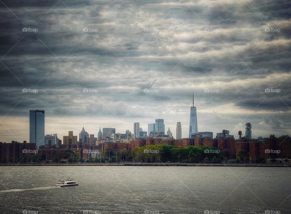 Water taxi on the East River approaching lower Manhattan 