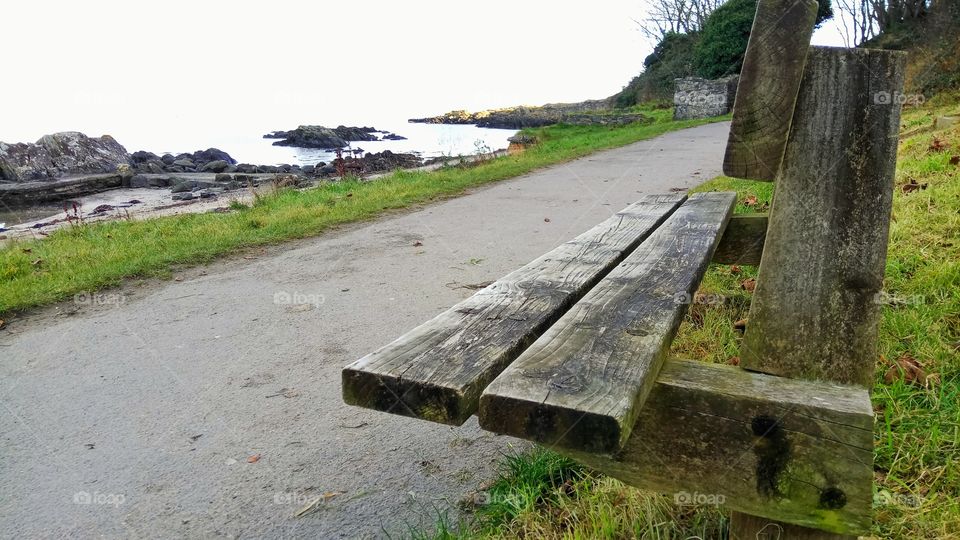 A lonely bench looking at the sea in Northern Ireland