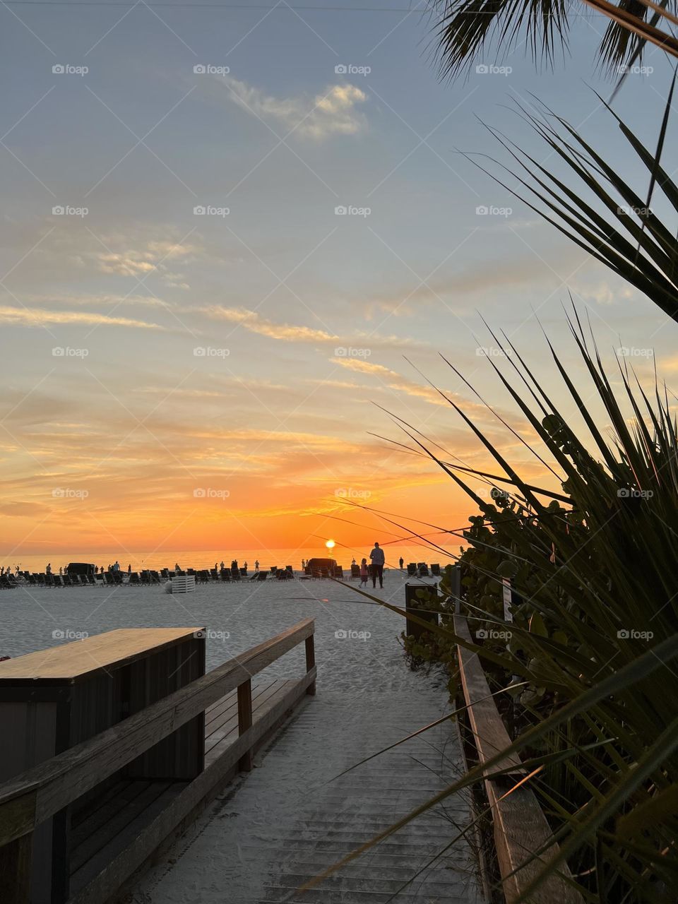Oceanfront beach walk with a sunset view 